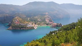 Aerial view of the Asos village from the Venetian Castle Ruins. Awesome spring seascape of Ionian Sea. Stunning outdoor scene of Kefalonia island, Greece, Europe.  Full HD video (High Definition)
