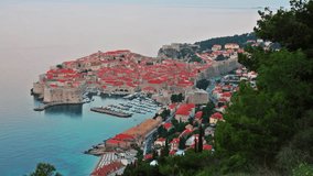Aerial evening view of Dubrovnik city. Splendid summer sunset in Croatia, Europe. Beautiful world of Mediterranean countries. Traveling concept background. Full HD video (High Definition).