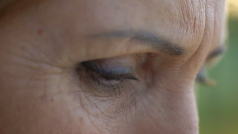 Hopeless senior woman looking into camera, worrying about future, close-up