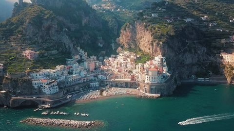 An amazing shot of the mountains and the village houses in Amalfi coast on a clear blue sky.