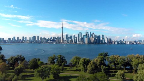 Aerial view of Toronto skyline including Centre Island and Lake Ontario on a summer day in Toronto, Ontario, Canada.