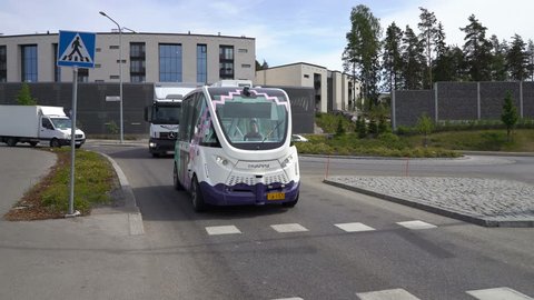 HELSINKI, FINLAND - JUNE 11, 2018: Automated remotely operated bus in Helsinki. Unmanned public transport on street.
