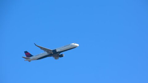 NEW YORK - 2018: Delta Airlines Airbus A321-200 Commercial Jet Airplane Flying in a Clear Blue Sky after Taking Off from JFK International Airport