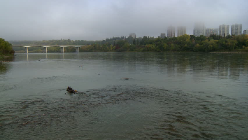 Looking northwest at Groat Road Bridge over the North Saskatchewan River in Edmonton, Canada, on a foggy morning.