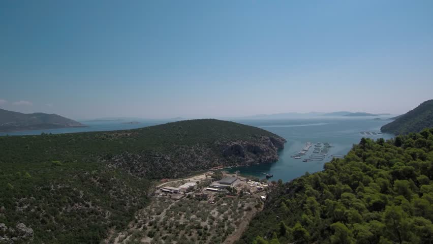 Aerial shot of a fish farm in Greece located in Saronic gulf near Sofiko village.