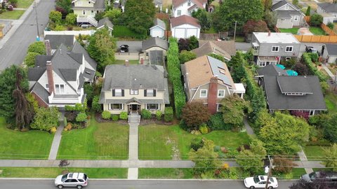 Aerial view of American suburban homes, rising jib shot