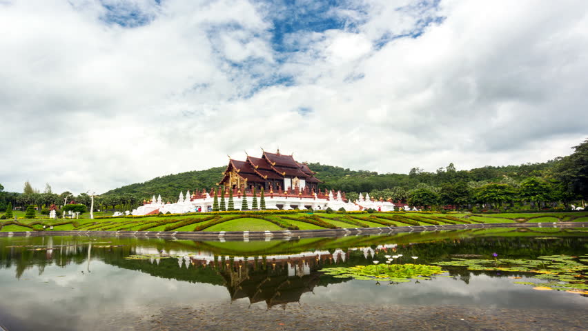 Time lapse video Royal Park Rajapruek Popular places of attraction in Chiang Mai with  reflecton and movement clouds backgroud