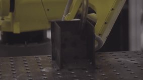 Close up robot welding. Industrial robot working in factory,Industry concept. Automation robot welding for assembly metal details - Powered by Shutterstock - Get 15% off with code: PIKWIZARD15