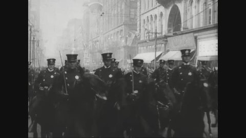 CIRCA 1920s - Marshal Ferdinand Foch is driven in a parade and he receives a degree at the University of St. Louis and he watches a parade.