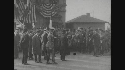CIRCA 1920s - Marshal Ferdinand Foch is greeted by the American Legion upon arrival and he is driven in a parade.