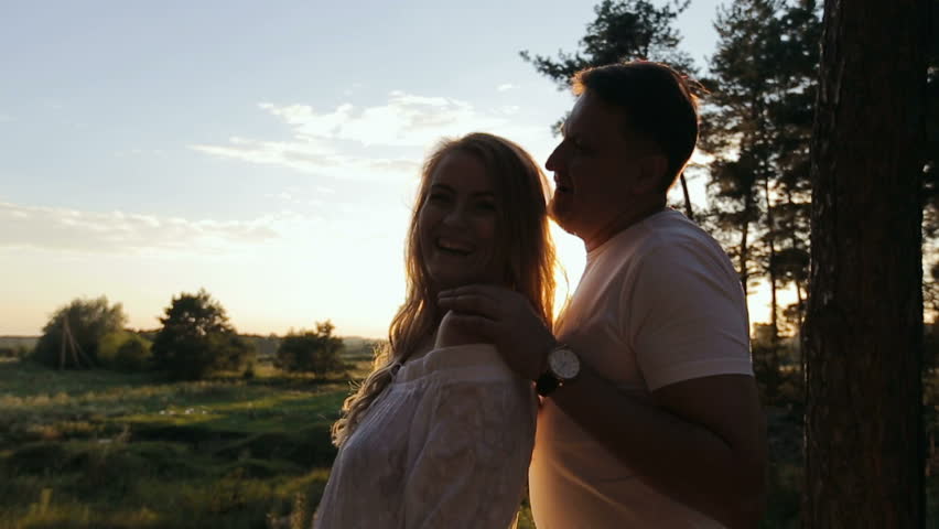 Couple in love cuddling in a park