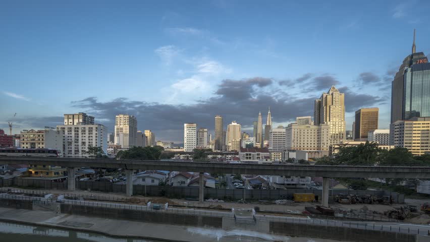 Timelapse of Kuala Lumpur Downtown with Metro passing by