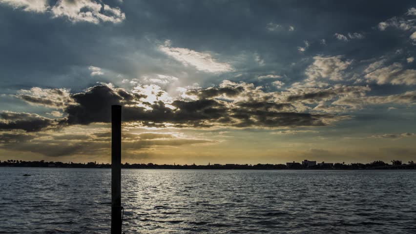 Time lapse of the sunset and clouds over West Palm Beach, Florida, on Lake Worth Lagoon
