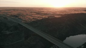 4K Epic Aerial shot of Perrine Twin Falls bridge at sunrise backward move.mov