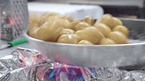 Small potatoes fried on olive in the restaurant - Powered by Shutterstock - Get 15% off with code: PIKWIZARD15