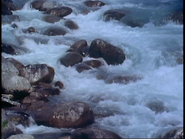 DENALI NATIONAL PARK, ALASKA, 1989, close up, river rushing over boulders