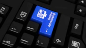 131. Online Advertising Rotation Motion On Blue Enter Button On Modern Computer Keyboard with Text and icon Labeled. Selected Focus Key is Pressing Animation. Advantage Marketing Concept