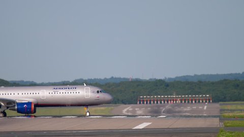 DUSSELDORF, GERMANY - JULY 22, 2017: Aeroflot Airbus 321 VP-BFX taxiing after landing. Dusseldorf Airport, Germany