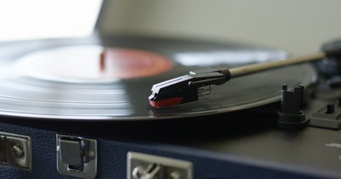 Record player playing vinyl very quickly - close up