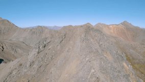 4k Aerial drone footage - Hikers atop a summit in the Colorado Rocky Mountains.  Sawatch Range