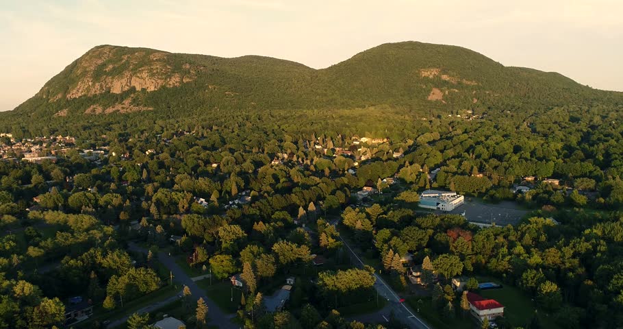 The Mont St.Hilaire in the Montreal region in Canada. Some houses are build near the mountain.