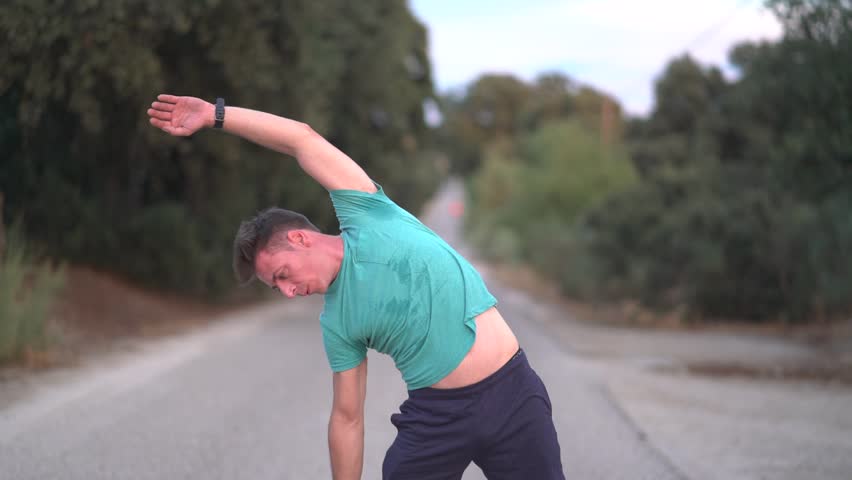 Classic vintage man does sport and runs in the field.