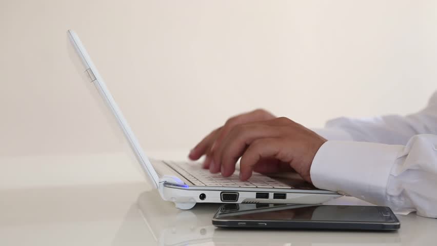 Using laptop working office
 | Shutterstock HD Video #1016609314