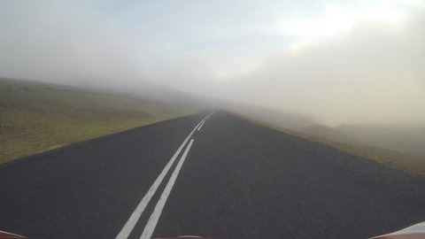 Driving curvy foggy mountain roads, POV hood cam, going down, Iceland.mov
