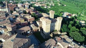 Aerial video of the Vignola town (Modena)  and view of the Vignola castle located in the town of the same name on the banks of the Panaro river