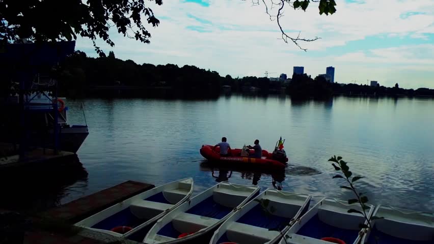 Pneumatic boat on the lake, morning view