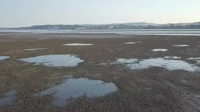 DRONE VIDEO flying over river estuary at Lympstone in Devon.