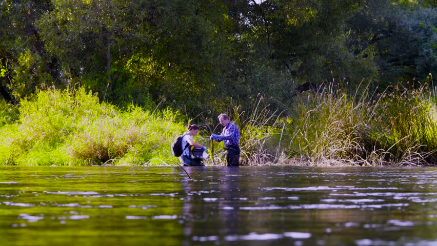 rubber boots in water