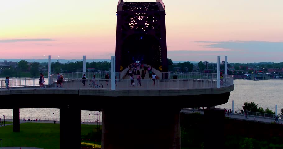 People traffic on Louisville walking bridge ascending
