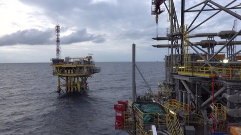 Scene of drilling oil rig and offshore platform