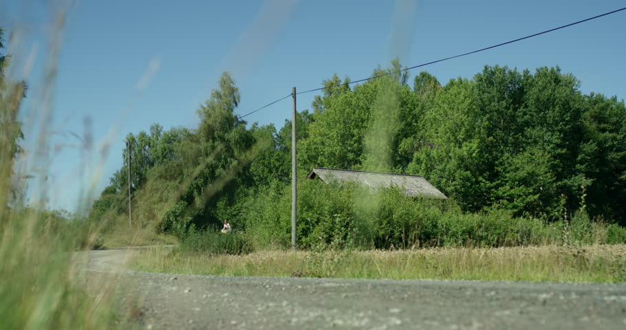 Woman on a bike in the countryside