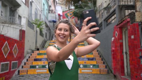 Happy beauty young brazilian woman taking a selfie photo in Rio de Janeiro, Brazil
