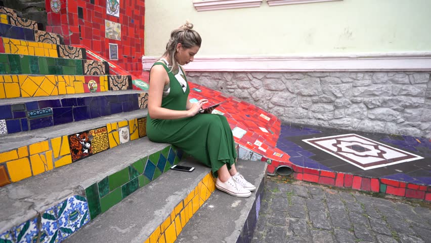 Happy beauty young brazilian woman working in a famous and culture turistic place in Rio de Janeiro, Brazil