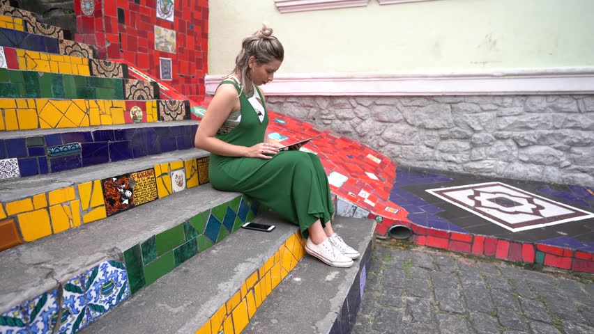 Happy beauty young brazilian woman working in a famous and culture turistic place in Rio de Janeiro, Brazil
