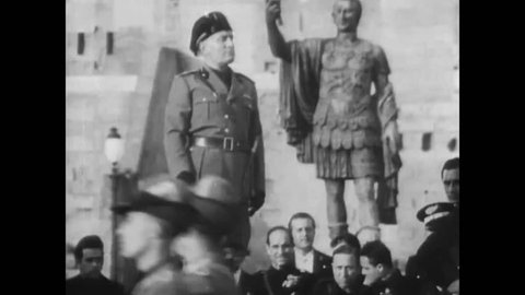 CIRCA 1950s - Mussolini is surrounded by fascist military members in the 1940s during the WWII.
