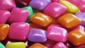 chewing gum of different colors. background of chewing gum. VIDEO dolly
