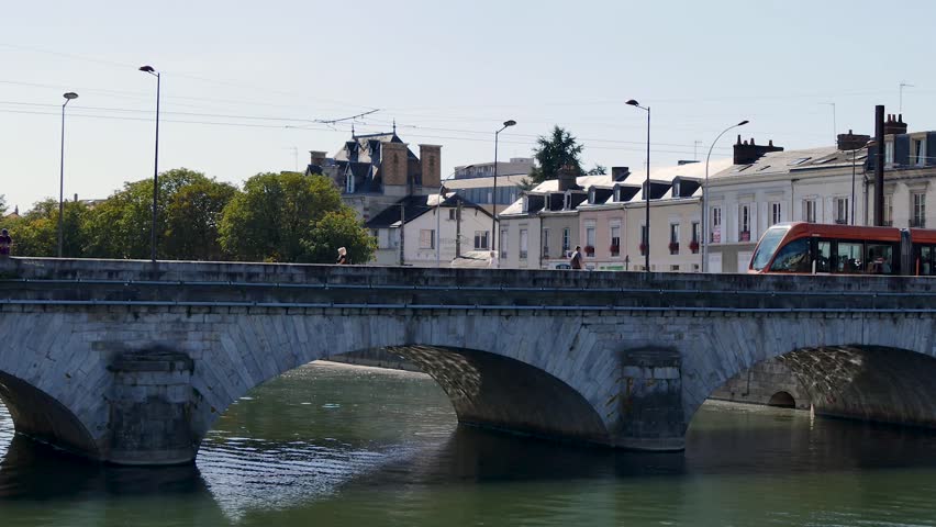 A tram passes through Le Mans, on a bridge over the Sarthe River. In 2015, the city had 143,325 inhabitants, making it the largest city in the Sarthe, the third largest city in the Pays de la Loire.