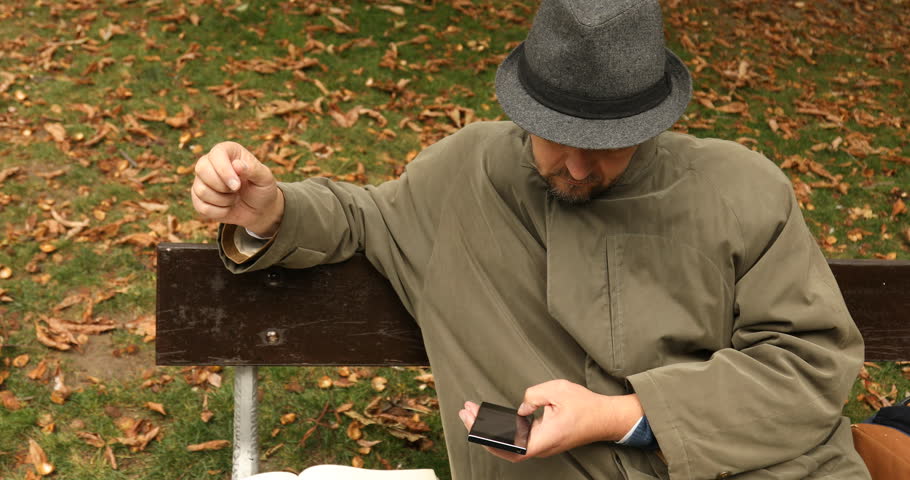 Male Model hands with cell phone Prague Europe 22nd Aug 2018