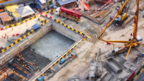Aerial Big Construction Site Working 4K Time Lapse Tilt-Shift (zoom in)