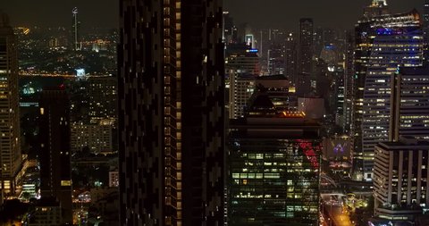 Thailand Bangkok Aerial v27 Detail panning view of condominium and cityscape at night 3/18
