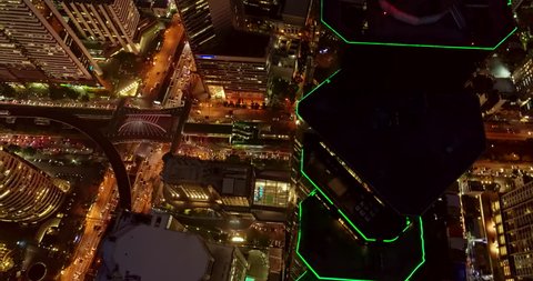 Thailand Bangkok Aerial v20 Panning birdseye view of cityscape with tower close up at night 3/18