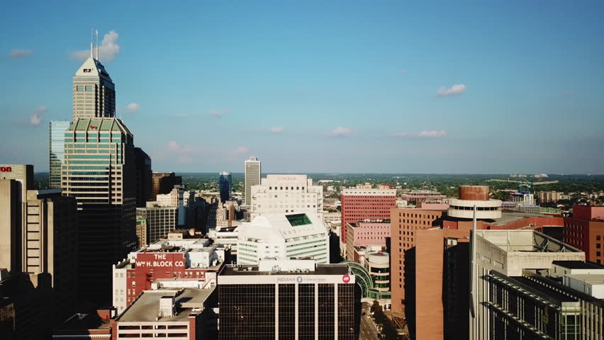4k aerial view and flyover of downtown Indianapolis and capitol building 