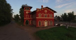 4K afternoon high quality aerial video view of old vintage but still used railway station designed by architect Benua, in the southern Saint Petersburg's suburb Strelna, the Russia's northern capital