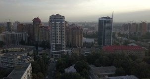Aerial view of Kiev City. Flying over modern buildings at sunset. Urban City 4k 4096 x 2160 pixels