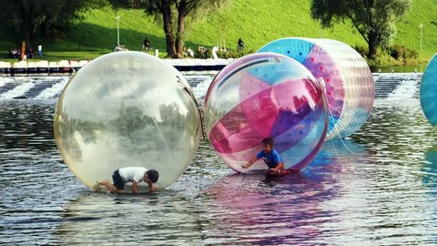 Munich, Germany - AUGUST 20, 2017: A floating water ball at a summer festival in the Olympic Park