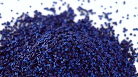 Close up of falling raw polypropylene granules for plastic industry